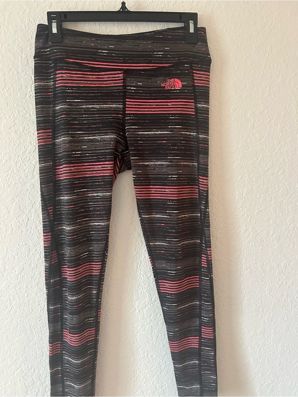 The North Face Black Leggings with Pink Stripe Details